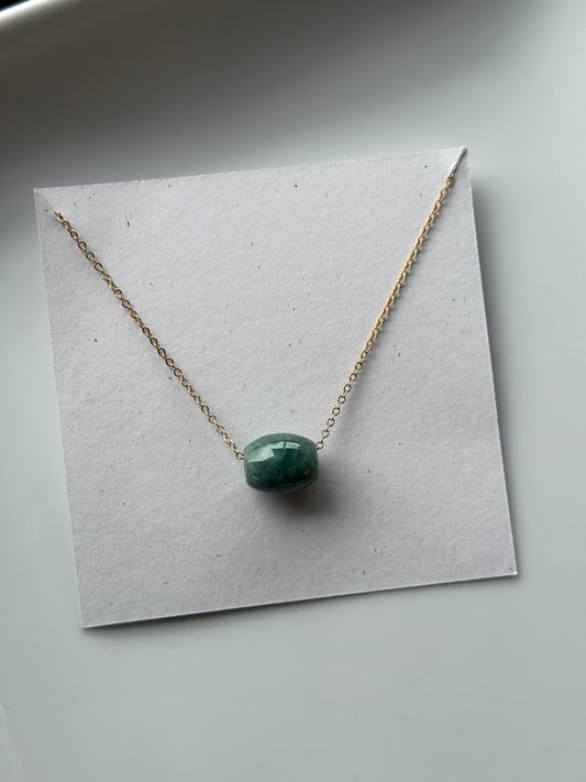 Floating green jade barrel necklace