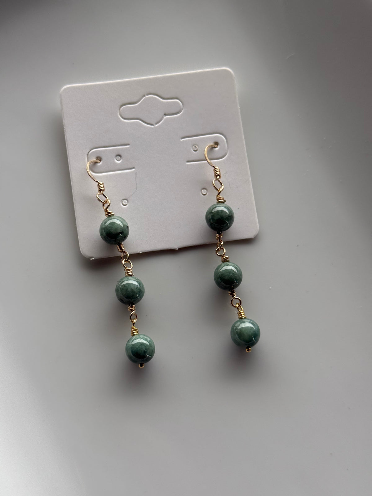 ʻEkolu drop jade earrings